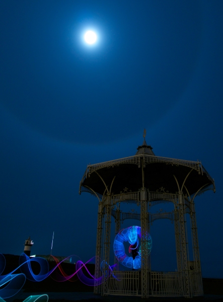 Lightpainting of an orb in The Bandstand under a moon halo